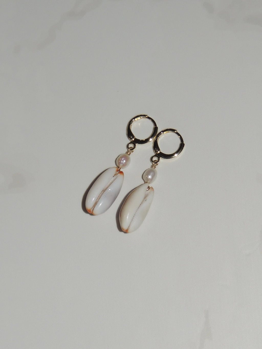 Isabella Cowrie Shell Huggies