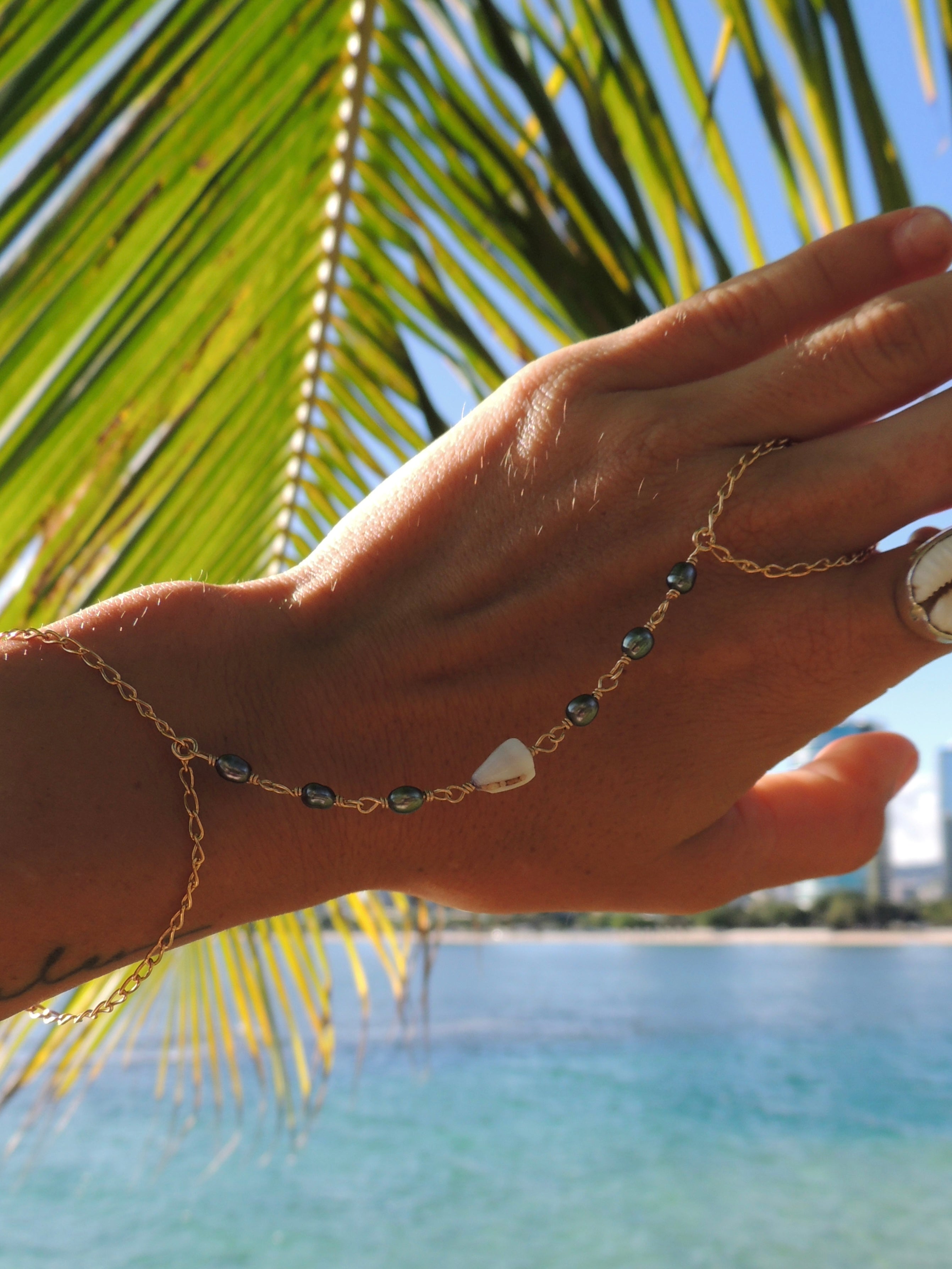 Cone Shell Handchain / Black Pearls