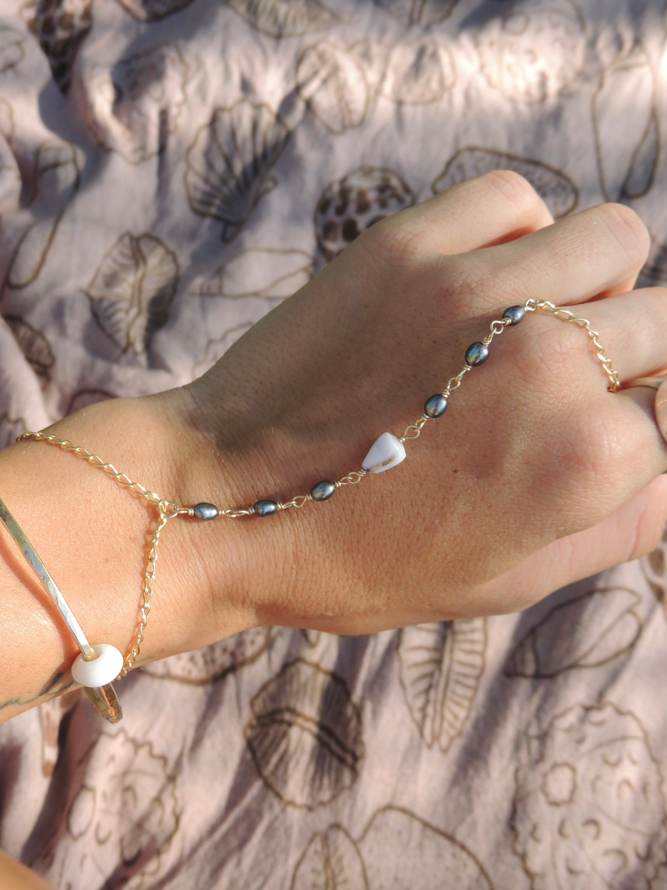 Cone Shell Handchain / Black Pearls
