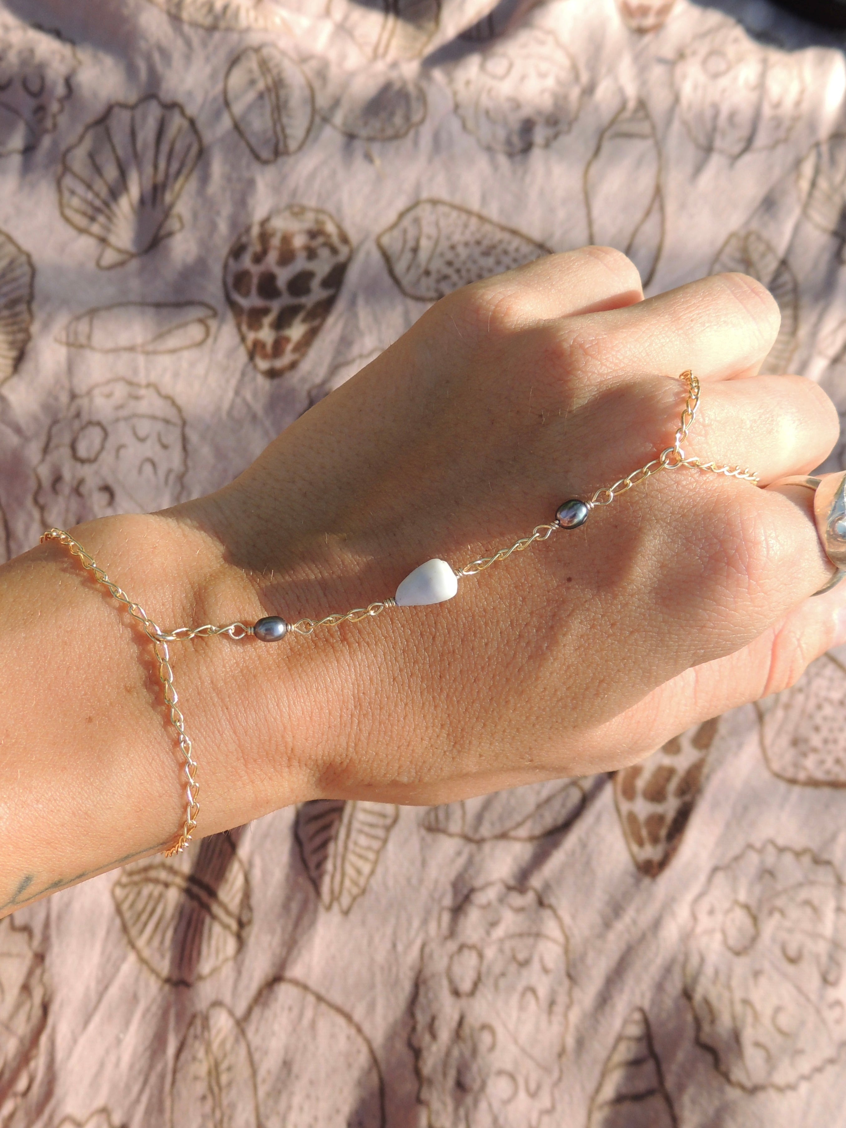 Cone Shell Handchain / Black Pearls