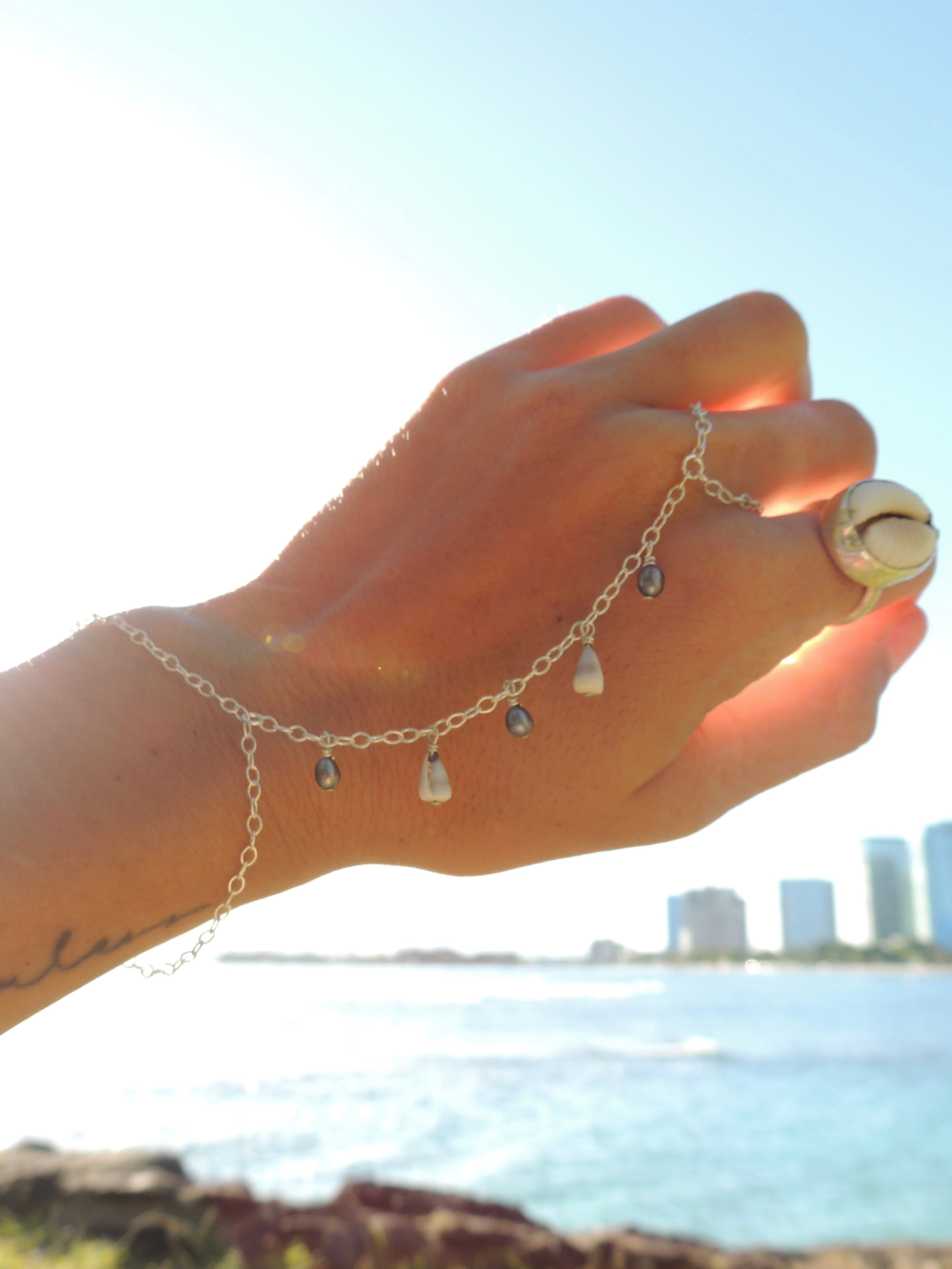 Cone Shell Handchain / Black Pearls