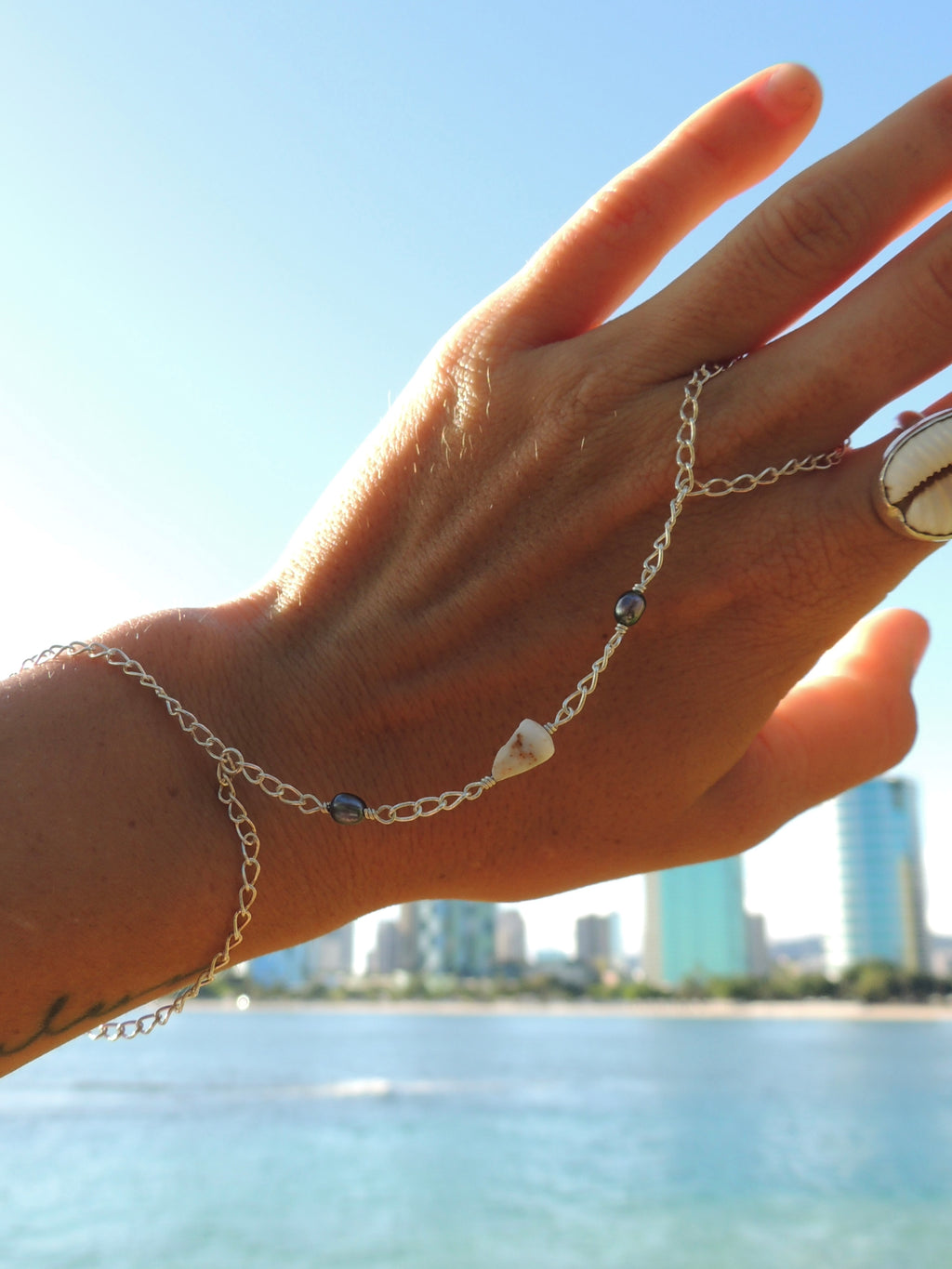 Cone Shell Handchain / Black Pearls