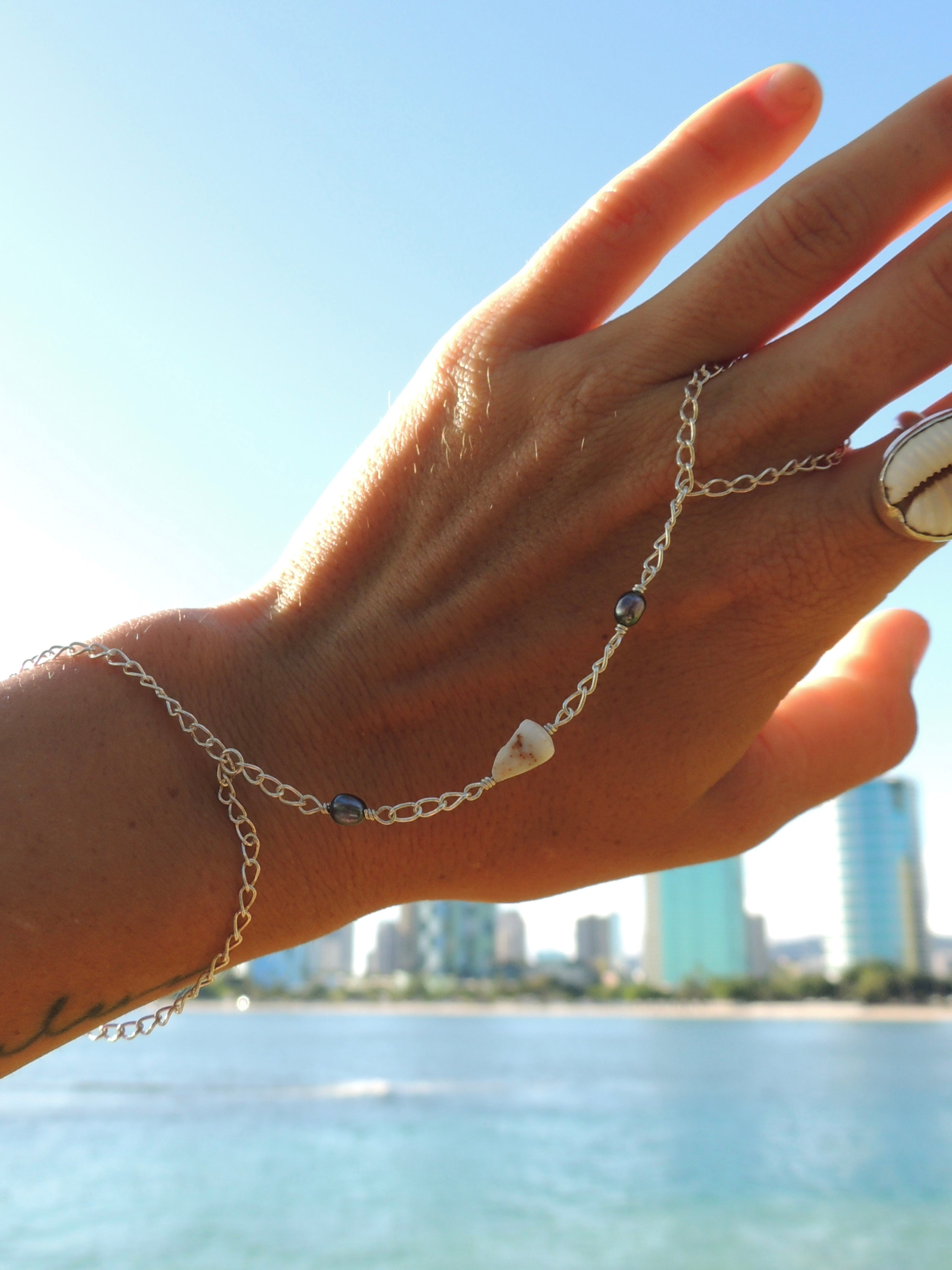 Cone Shell Handchain / Black Pearls